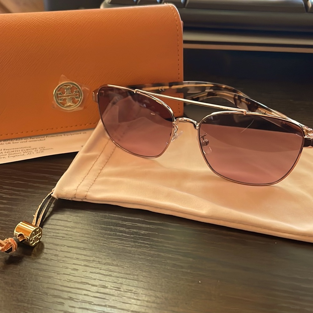 Tory Burch, sunglasses with soft and hard case.